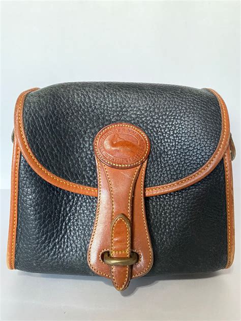 Dooney and bourke vintage purse - Vintage Dooney & Bourke All-Weather Leather Handbags Restored. ... Vintage Dooney Bourke Repairs & Restoration Dept. Free Priority Shipping on Orders $119+ Our Policies; 